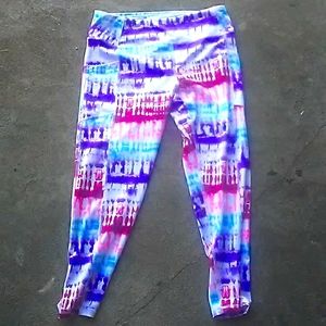 The size is a large the colors are purple pink blue the brand name is Pro Player